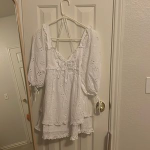 This is a brand new For Love and Lemons dress with tags. It has no flaws.